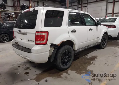 2009 Ford Escape Hybrid Limited из США, поврежденный, VIN 1FMCU49319KB07111